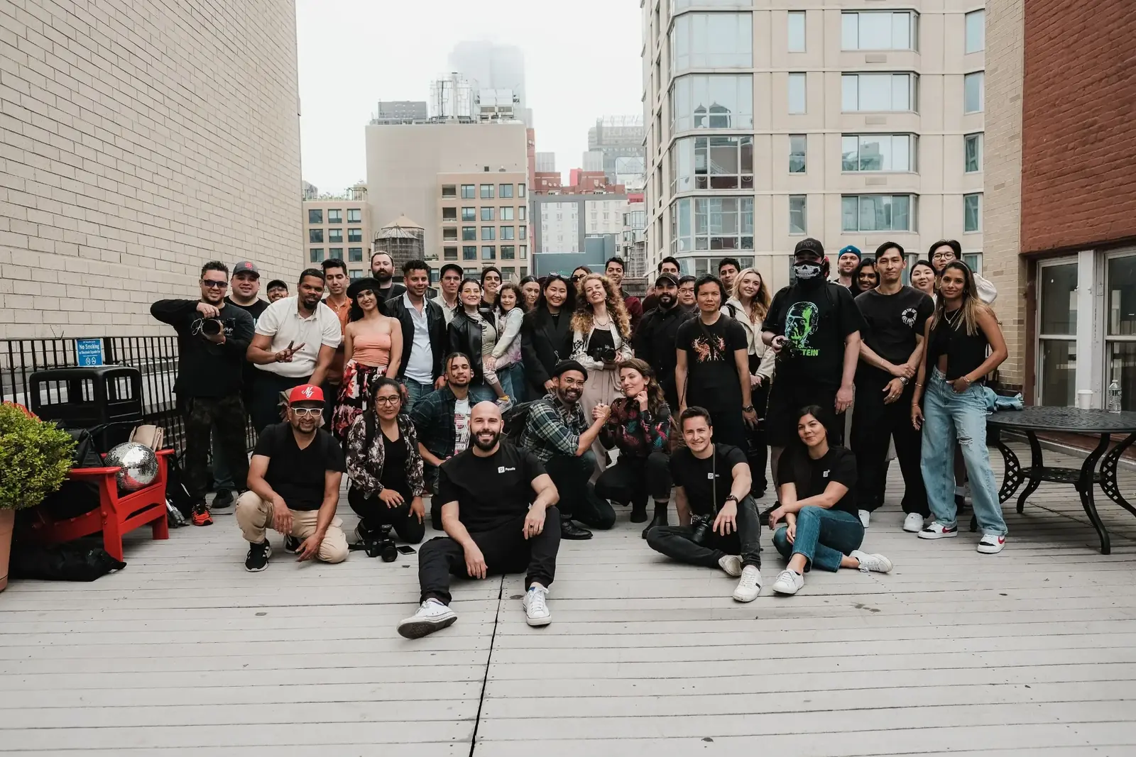 Group of workforce program participants gathered on a rooftop